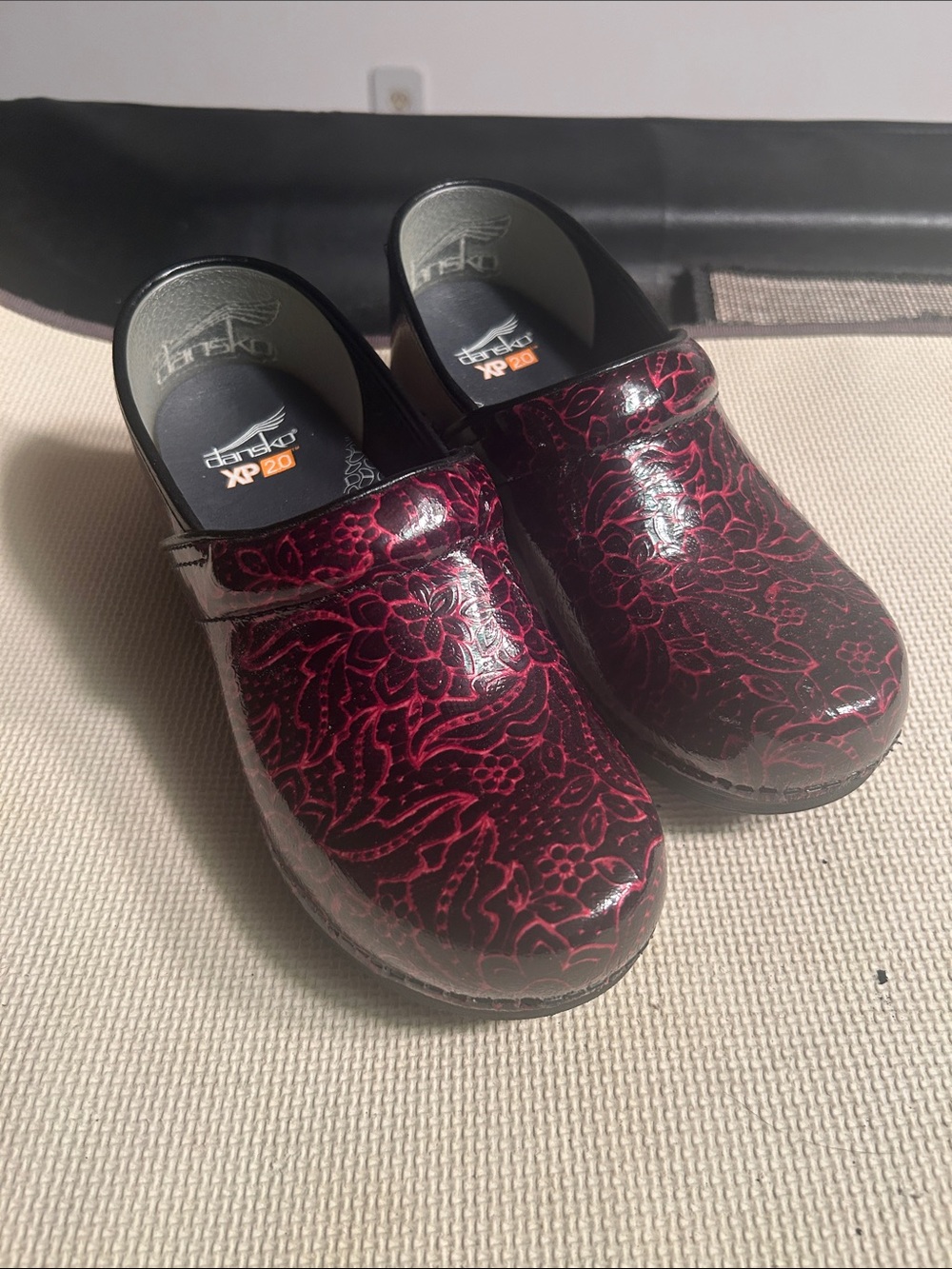 Dansko Patent Floral Clogs in Burgundy
